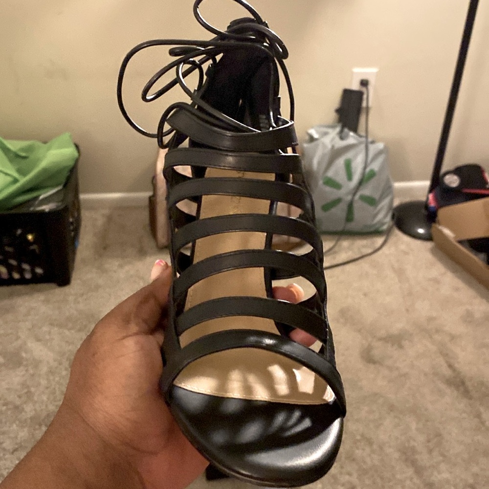 Black high heel strappy sandal.